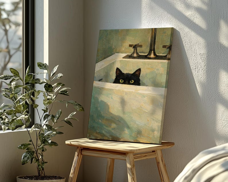 May include: A canvas print depicting a black cat peering over a bathtub's edge. The artwork uses muted green and cream tones, giving it a vintage feel. The cat's eyes are visible, adding a playful element to the scene.