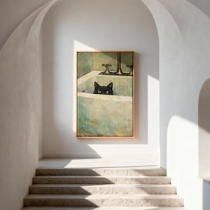 May include: A framed painting of a black cat in a bathtub. The cat's eyes are visible above the tub's edge. The artwork has a vintage aesthetic with a gold frame and a green and white colour palette. The painting is displayed in a bright, white hallway.