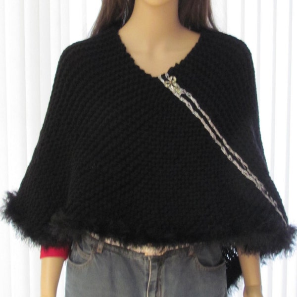 BLACK KNIT PONCHO,  hand knitted, bulky weight,  acrylic fun fur trim yarn, with silver accent and removable brooch