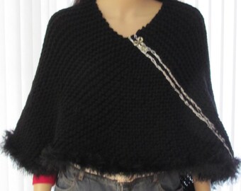 BLACK KNIT PONCHO,  hand knitted, bulky weight,  acrylic fun fur trim yarn, with silver accent and removable brooch