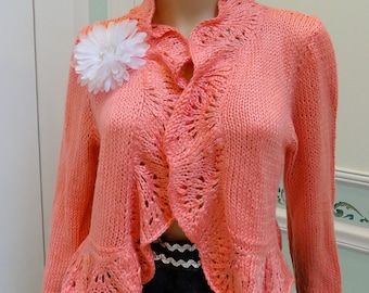 WOMEN'S HANDKNITTED, Shrug/sweater, Strawberry color, medium / large,  soft lt.weight, silky yarn with a lacey open pattern on all edges.