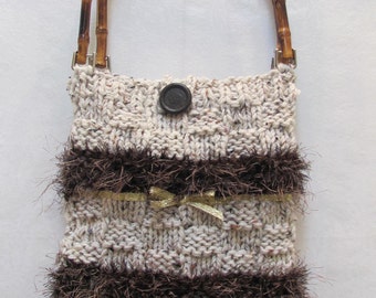 HANDKNITTED Beige, Handbag/ purse, made of an ivory heather yarn with brown  accents and bamboo handles