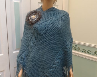 Sale, WOMEN'S HANDKNITTED PONCHO: blue denim color yarn, worsted weight, cable stitch, 5" fringe  with removable brooch