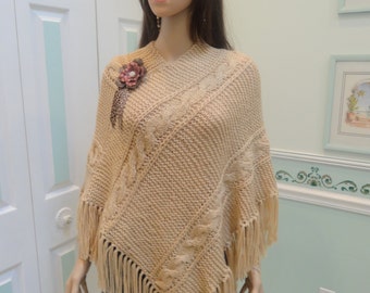 Sale, WOMEN'S handknitted, PONCHO, beige, medium to large, acrylic, worsted weight, cable pattern stitch, 5" fringe, removable leather pin