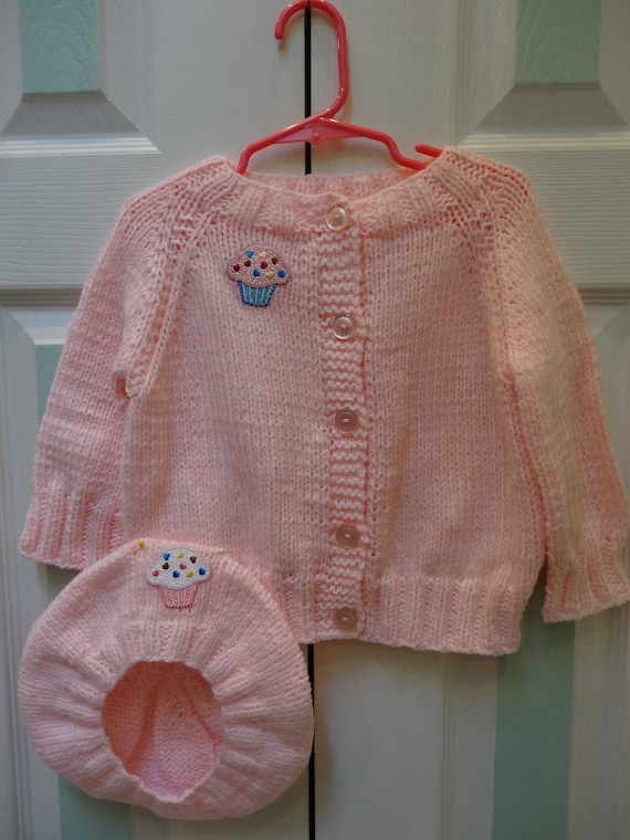 REALLY CUTE ..SIZE 1. NEW HANDKNITTED JUMPER CUP CAKE..