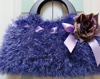 Sale-WOMEN'S, HANDKNITTED  HANDBAG/Purse,sale item,  knitted in a  fur like yarn with  black wooden handles and a purple ,lavender rose