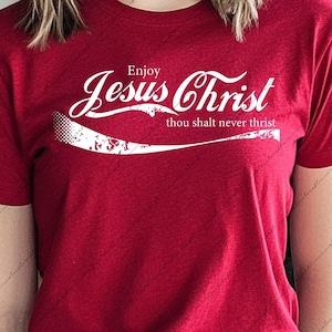 May include: A red t-shirt with the words "Enjoy Jesus Christ thou shalt never thrist" in white script. The design is reminiscent of a popular soda logo. The shirt is a digital download file.