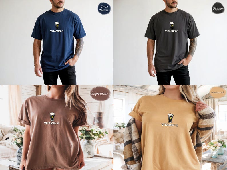 May include: Four t-shirts in navy blue, pepper, espresso, and mustard colors. Each shirt features a graphic of a pint of beer with the text "Vitamin G" below it. The shirts have short sleeves and a relaxed fit.