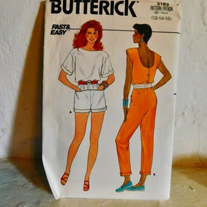 May include: A vintage sewing pattern for a jumpsuit and shorts. The pattern is from Butterick and is for sizes 12-14-16. The pattern is called "Fast & Easy".