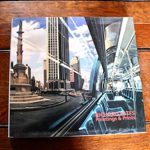 May include: A book cover featuring a cityscape and a bus interior painting by Richard Estes. The cover art depicts a street scene with tall buildings, a monument, and a bus interior with blue seats. The title "Paintings & Prints" is visible.