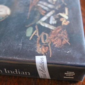 May include: A black book with the words 'First Edition' on a white label and the words 'Indian' and 'III' on the cover. The Arts of the North American Indian Native Traditions in Evolution Edwin L. Wade  Hardcover w dust Jacket First Edition ISBN 0-933920-55-5