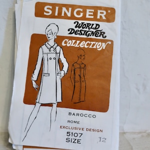 May include: A vintage Singer sewing pattern for a dress and coat. The pattern is from the World Designer Collection, Barocco Rome, and is size 5107.