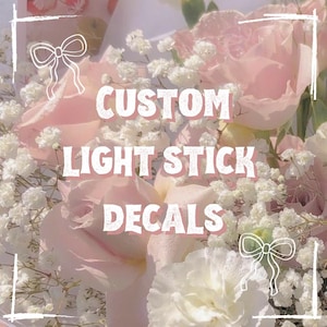 May include: Custom light stick decals with a pink and white floral background. The text "CUSTOM LIGHT STICK DECALS" is written in white on a pink background.