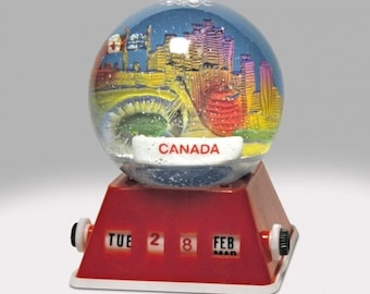 Vintage Canada Souvenir Snow Globe with Calendar Base Snowglobe Snowdome