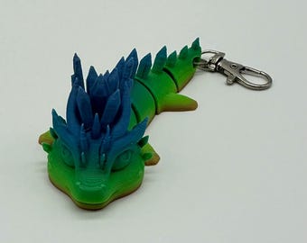 Llavero articulado de bebé dragón / Impresión 3D en dorado, azul y verde degradado / Dije de mochila de fantasía