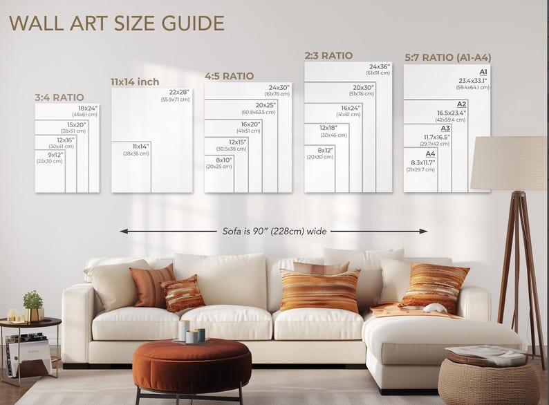 May include: Wall art size guide with various aspect ratios and dimensions in inches, including 3:4, 4:5, 2:3, and 5:7 (A1-A4). The sofa is 90 inches wide. The image shows a living room with a white sofa and orange pillows.