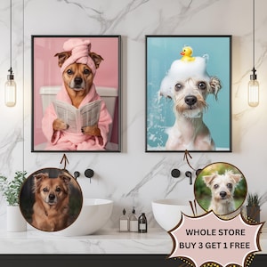 May include: Two framed pictures of dogs in a bathroom setting. The image on the left shows a dog wearing a pink bathrobe and reading a newspaper. The image on the right shows a dog with a yellow rubber duck on its head covered in bubbles. The text "WHOLE STORE BUY 3 GET 1 FREE" is visible in the bottom right corner of the image.