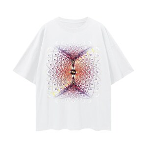 A white short-sleeve t-shirt displaying a surreal patterned graphic with rows of eyes and geometric shapes.