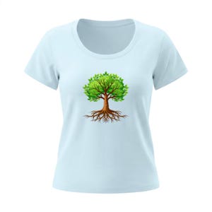 May include: Light blue t-shirt with a round neck and short sleeves. The shirt features a graphic of a tree with green leaves and brown roots. The tree design is centered on the front of the shirt.