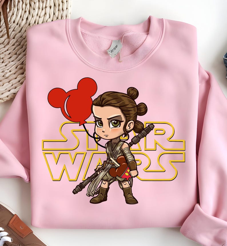 Star Wars shirt featuring fan-favorite characters like Darth Vader, Baby Yoda, Chewbacca, and Han Solo with fun Mickey head accents. This soft, unisex tee or sweatshirt is perfect for Disney trips, Star Wars Day, or matching family outfits. A playful mix of galaxy and Disney magic, ideal for park hopping, themed parties, or gifting to fans of the Mandalorian and the whole Star Wars crew.