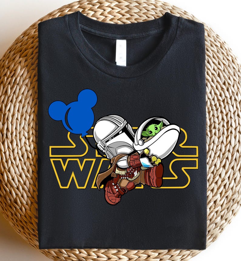 Star Wars shirt featuring fan-favorite characters like Darth Vader, Baby Yoda, Chewbacca, and Han Solo with fun Mickey head accents. This soft, unisex tee or sweatshirt is perfect for Disney trips, Star Wars Day, or matching family outfits. A playful mix of galaxy and Disney magic, ideal for park hopping, themed parties, or gifting to fans of the Mandalorian and the whole Star Wars crew.