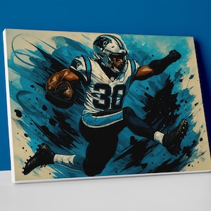 May include: Canvas art print of a football player in a Carolina Panthers uniform, number 30. The artwork features a dynamic pose with blue and black paint splatter effects. The player is holding a football.