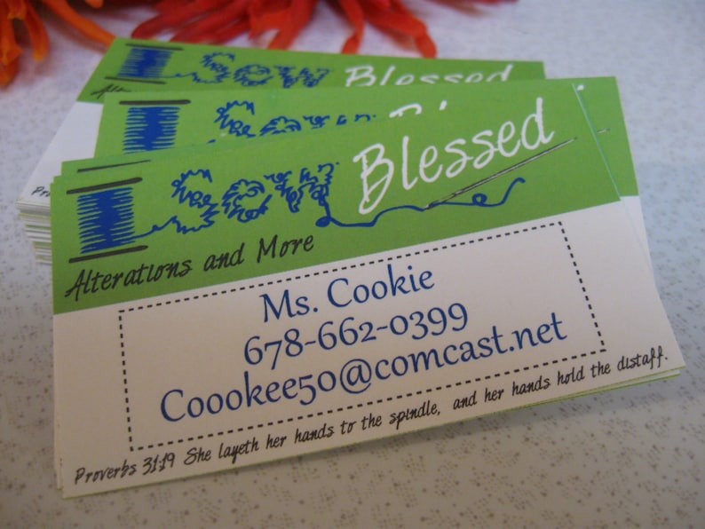May include: Green and white business card with the text "Sew Blessed" and "Alterations and More". The card also includes a phone number, email address, and a quote from Proverbs 31:19.