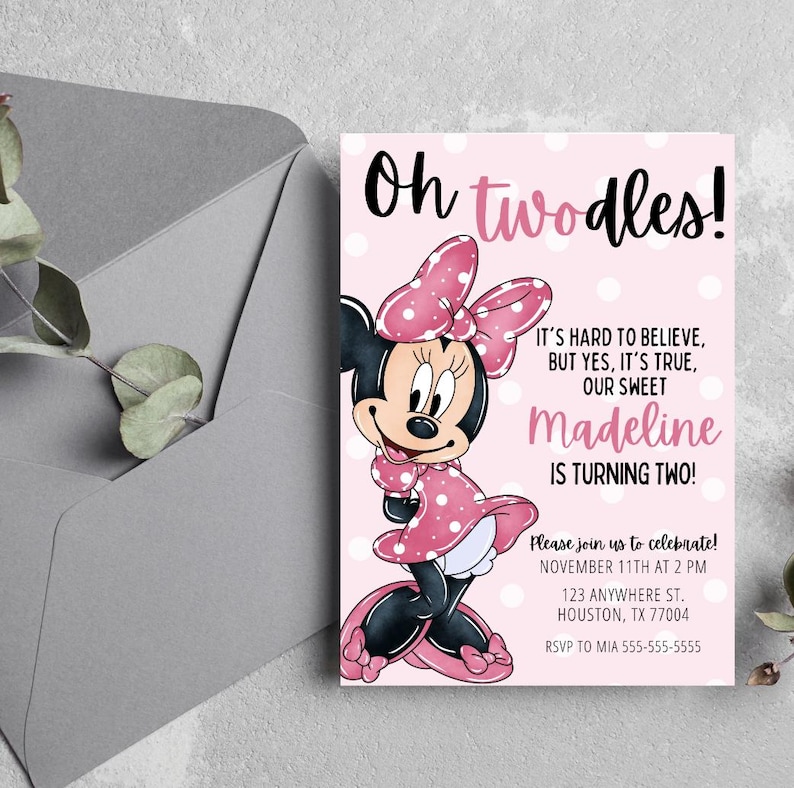 May include: A pink Minnie Mouse birthday invitation with the text "Oh twodles!" and "Madeline is turning two!" The invitation features a cartoon illustration of Minnie Mouse in a pink polka dot dress and bow. An envelope is in the background.