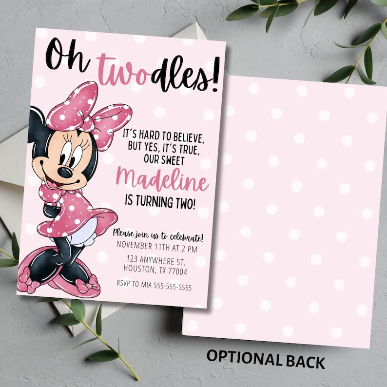 May include: A pink and white invitation card with the text "Oh twodles!" and a cartoon of Minnie Mouse. The invitation includes the text "Madeline is turning two!" and event details. The back of the card has a pink polka dot pattern.