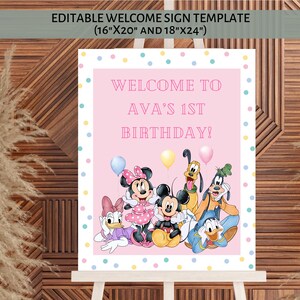 May include: A pink welcome sign template with the text "WELCOME TO AVA'S 1ST BIRTHDAY!" and cartoon characters. The sign is decorated with colorful polka dots and is available in 40.6cm x 50.8cm and 45.7cm x 61cm sizes.