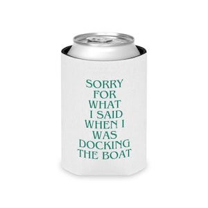 May include: White can cooler with the text "Sorry for what I said when I was docking the boat" in green.