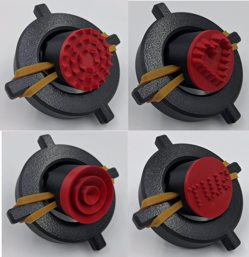 May include: Four black and red stampers with different designs. Each stamper has a black base, a red stamp, and is secured with a yellow rubber band. The stamp designs include a flower, a heart, concentric circles, and the word "WOW".