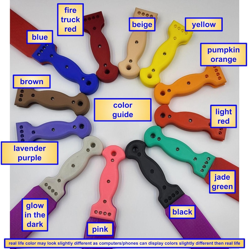 May include: A collection of paint scrapers in various colors, including blue, red, yellow, and black. The handles are ergonomically designed, and the blades are rectangular. The image includes a color guide and text indicating color variations may occur.