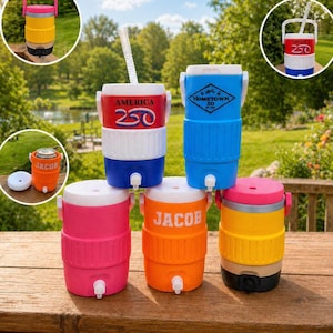 May include: A selection of brightly coloured beverage coolers with white lids and spouts. The coolers are in various colours, including red, blue, pink, orange, and yellow. Some coolers have text that reads "AMERICA 250" and "JACOB".
