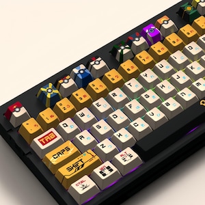 May include: A black mechanical keyboard with colorful keycaps featuring Japanese characters and symbols. The keyboard has a variety of keys, including function keys, arrow keys, and number keys. The keycaps are made of a durable plastic and have a smooth, matte finish.
