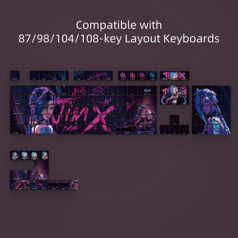 May include: Keyboard keycaps with a Jinx theme, featuring artwork of the character in shades of blue, pink, and purple. The keycaps are designed for 87, 98, 104, and 108-key layout keyboards. The word "JINX" is prominently displayed.