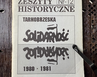 May include: A vintage Polish magazine cover titled "Tarnobrzeskie Zeszyty Historyczne Nr-12" with the word "Solidarność" in bold, stylized lettering. The cover is in black and white, with the years 1980-1981 printed at the bottom.