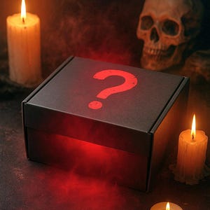 May include: A black box with a red question mark on top, lit by candles and a red glow. A skull is in the background. The scene evokes mystery and suspense, perfect for a Halloween or gothic theme.