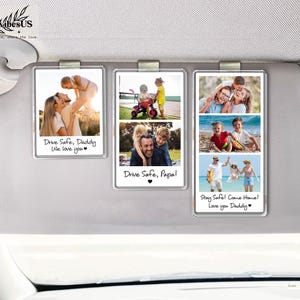 May include: Three rectangular photo car visor clips with family photos. Each clip has a different photo and a message: "Drive Safe, Daddy We love you", "Drive Safe, Papa!", and "Stay Safe! Come Home! Love you Daddy".