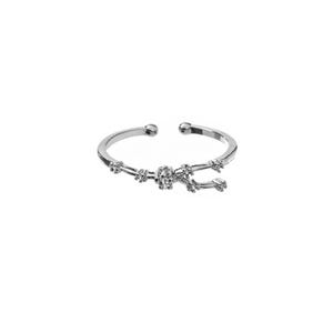 May include: A silver adjustable ring with a delicate design of a constellation with small clear stones.