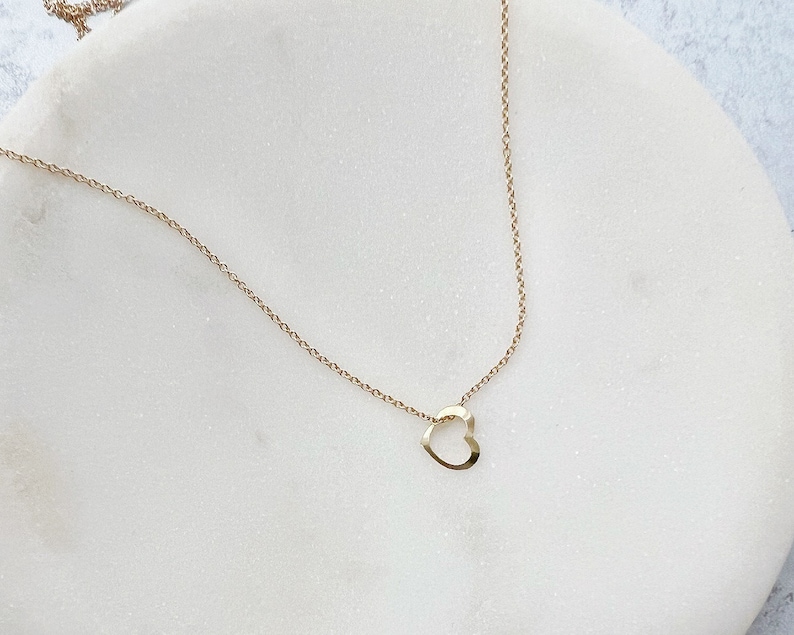 a gold open heart necklace