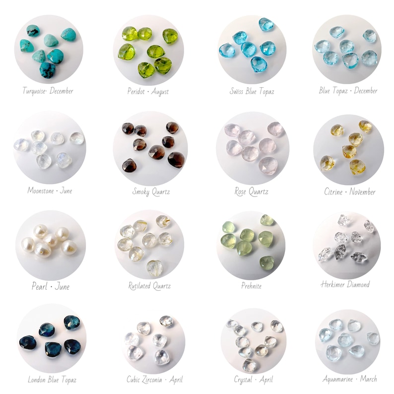May include: A collection of 12 different gemstone heart shapes, each with a different color and name. The gemstones are arranged in a grid pattern on a white background. The names of the gemstones and their corresponding months are listed below each heart shape.