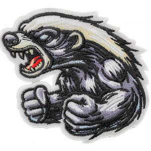 May include: An embroidered patch of a cartoon badger with a white stripe down its back, snarling with its mouth open, showing sharp teeth. The badger is in a fighting stance with its fists clenched.