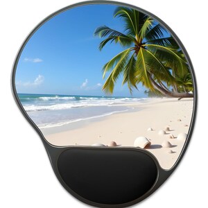 May include: A black ergonomic mouse pad with a beach scene. The image shows a white sandy beach, blue ocean, palm trees, and a clear blue sky. The pad has a built-in wrist rest.