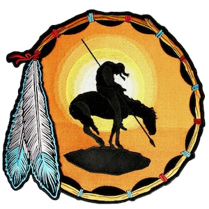 May include: Embroidered patch featuring a Native American on horseback with a spear, set against a sunset backdrop. The design includes a decorative border and two feathers with blue accents. The color palette includes shades of orange, yellow, black, and white.