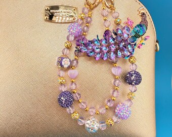 Cadena para bolso con dije de pavo real morado con diamantes de imitación: cadena para teléfono con cuentas de cristal hecha a mano, llavero brillante y brillante.