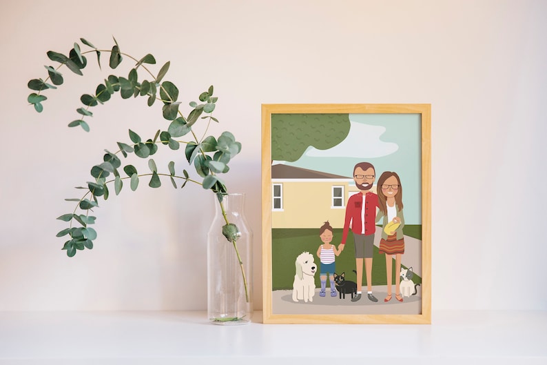 May include: A framed illustration of a family with two children and three pets standing in front of a house. The family is wearing casual clothing and smiling. The house is yellow with a green lawn. The illustration is in a light wood frame.
