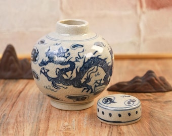 1960s, imitation of Jiajing - period blue - and - white porcelain vase of the Ming Dynasty, hand - painted with cloud - dragon patterns.