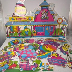 Huevo de Pascua de cartón troquelado con diseño de pueblo retro de Eggville de tendencia vintage