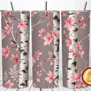 May include: Set of five 20 oz. insulated tumblers with a nature-inspired design. The tumblers feature a gray background with birch tree trunks and pink maple leaves. Each tumbler has a silver lid and a silver straw.